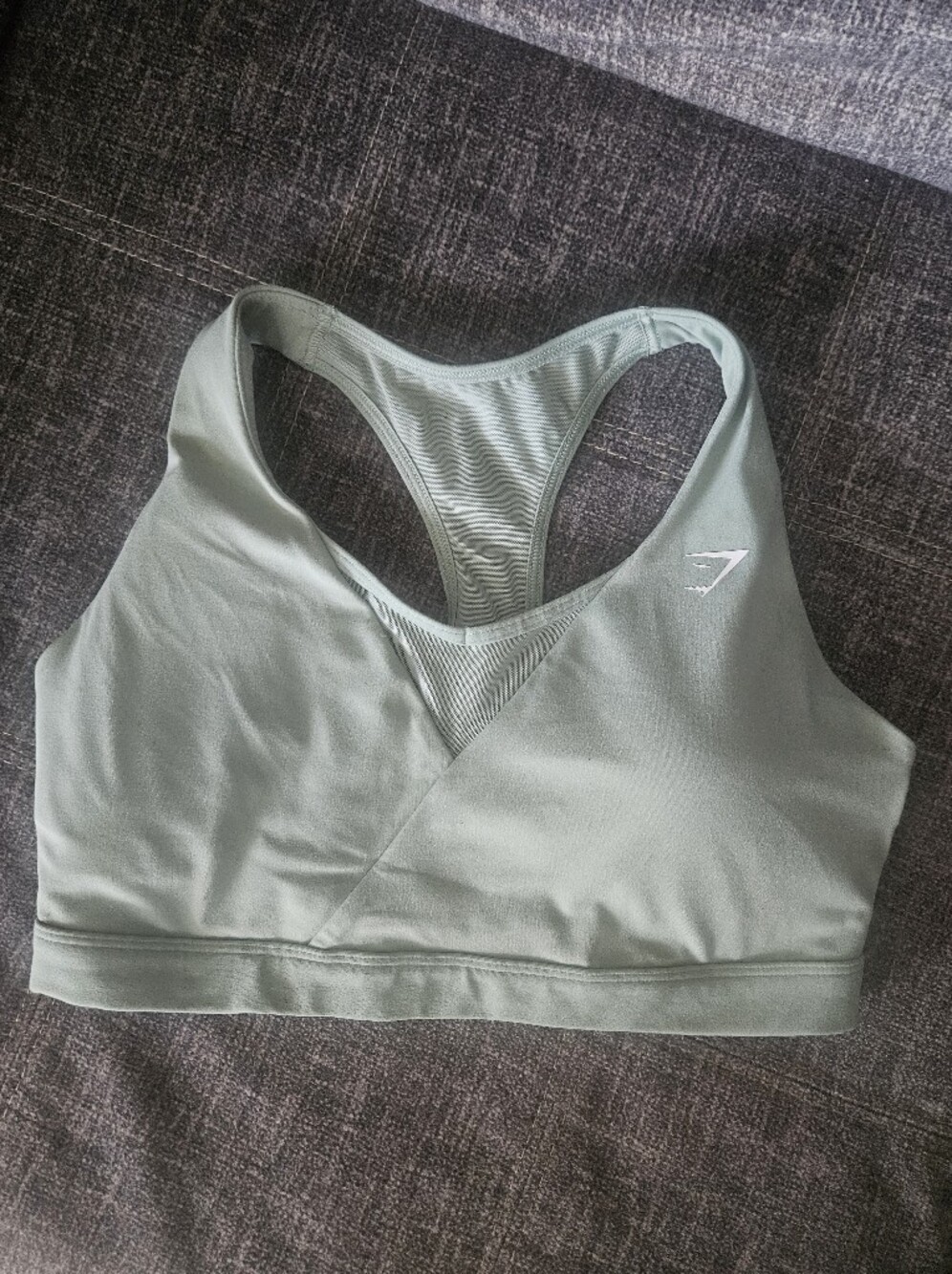 Gymshark Crossover Sports Bra in desert sage green. M.